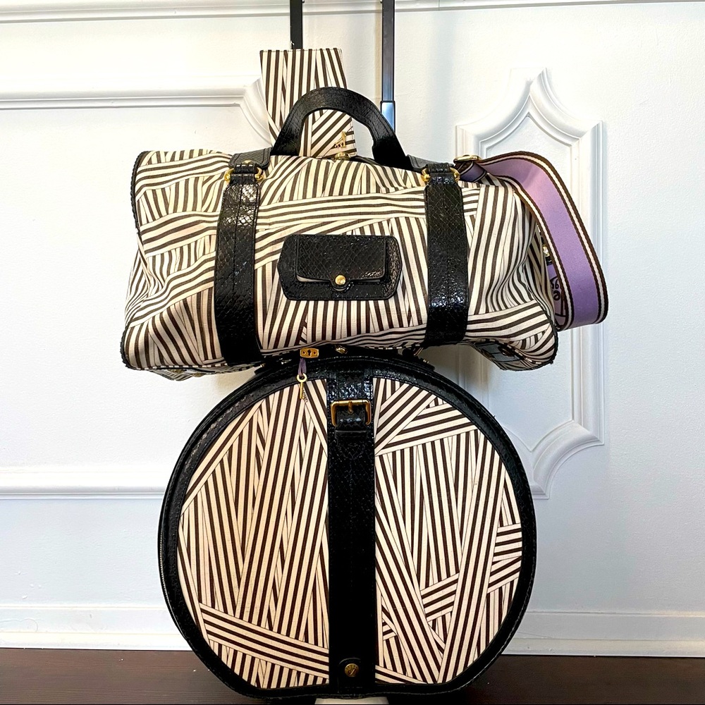 Henri Bendel disturbed stripe rolling hard sided hat box and duffle luggage set